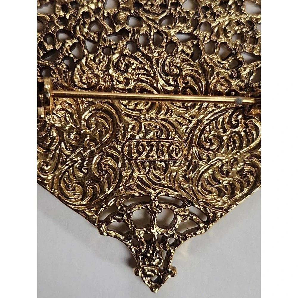 vintage 1928 brand brooch